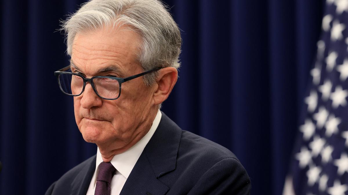 Fed leaves key rate unchanged as it awaits the impact of tariffs and Trump again scolds Powell