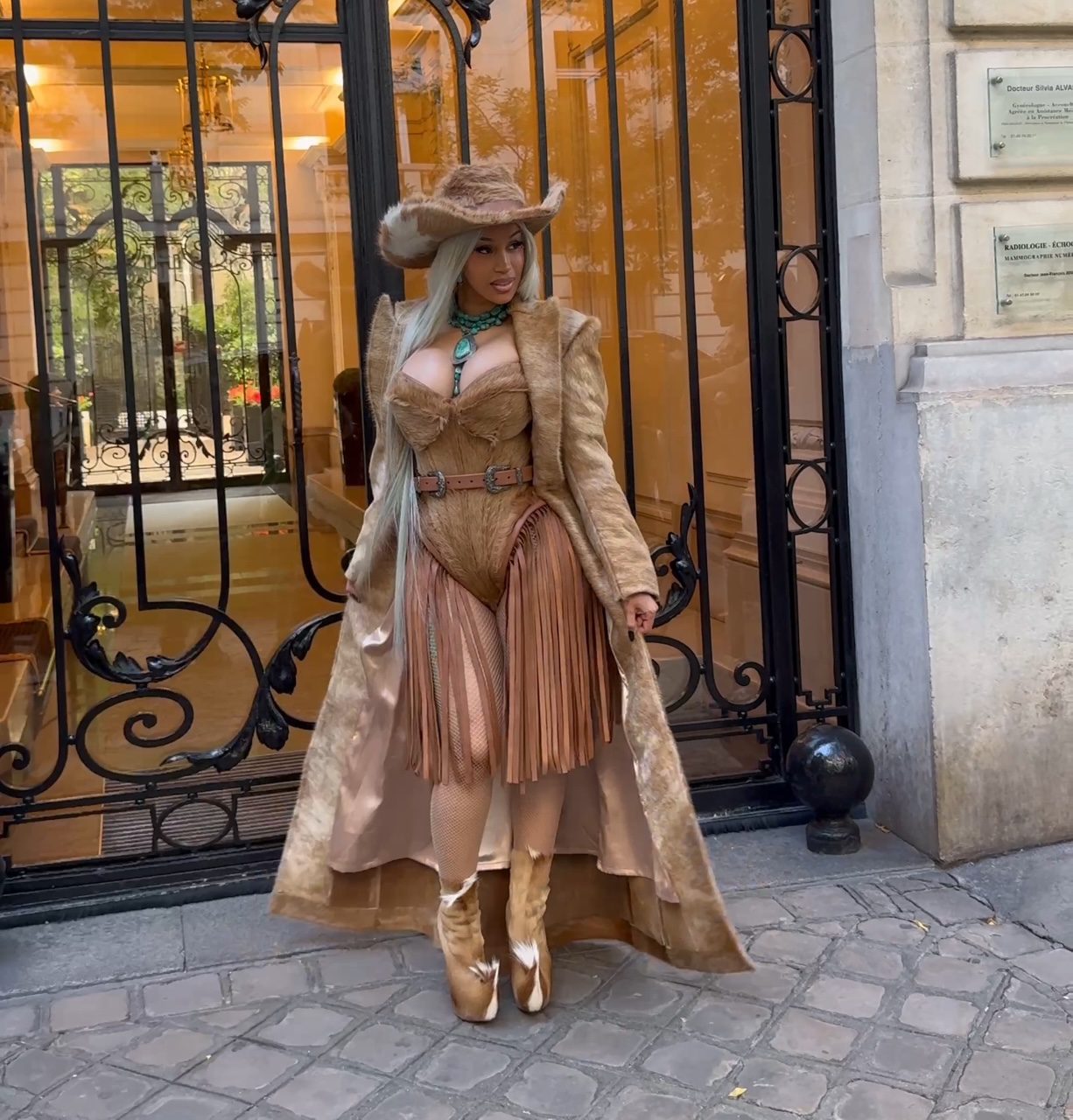 Cardi B Wears Tan Candice Cuoco Corset and Pony Hair Louboutins to Beyoncé’s Cowboy Carter Tour in Paris Cardi B Wears Tan Candice Cuoco Corset and Pony Hair Louboutins to Beyoncé’s Cowboy Carter Tour in Paris