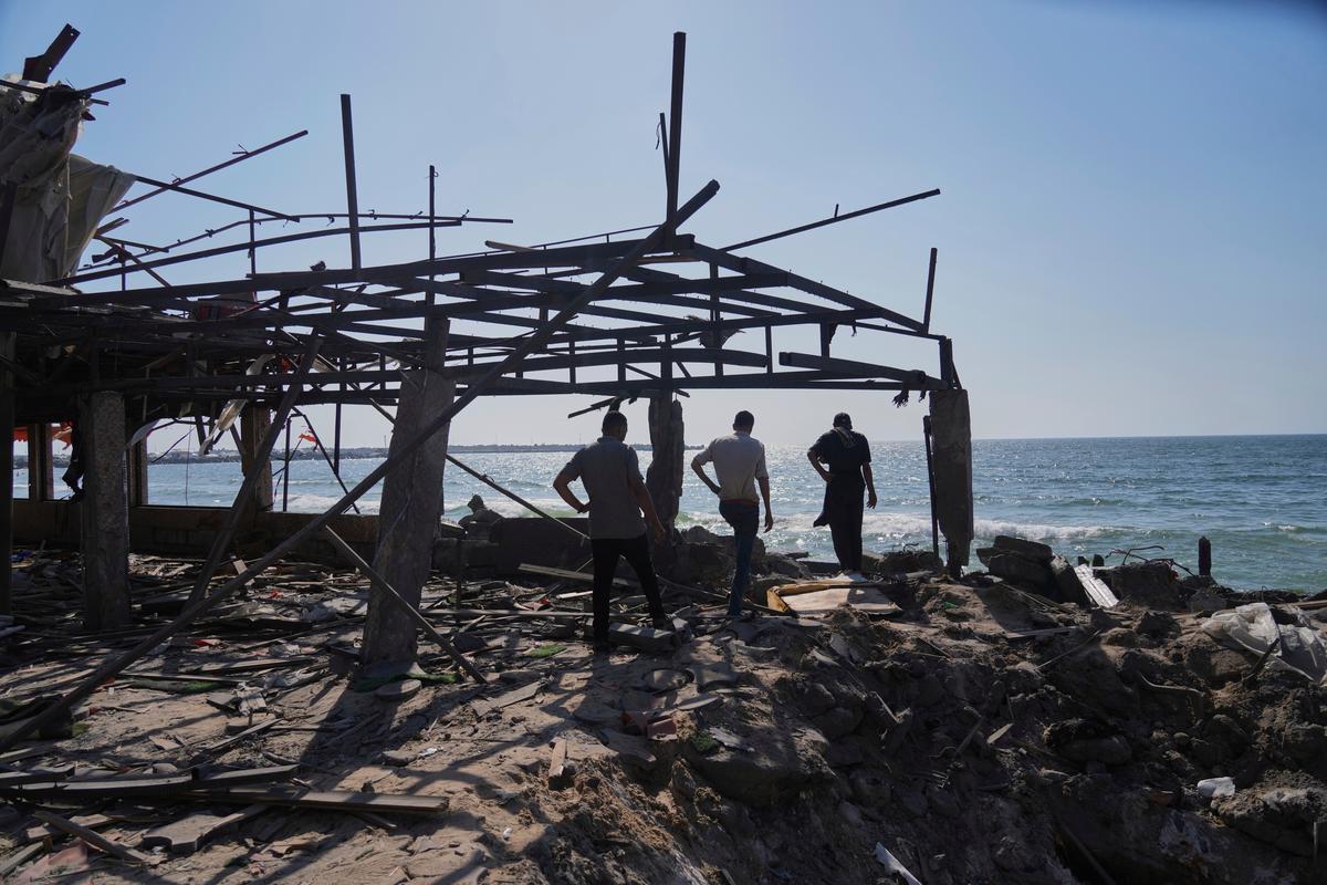 74 killed in Gaza as Israeli forces strike cafe, fire on people seeking food 74 killed in Gaza as Israeli forces strike cafe, fire on people seeking food