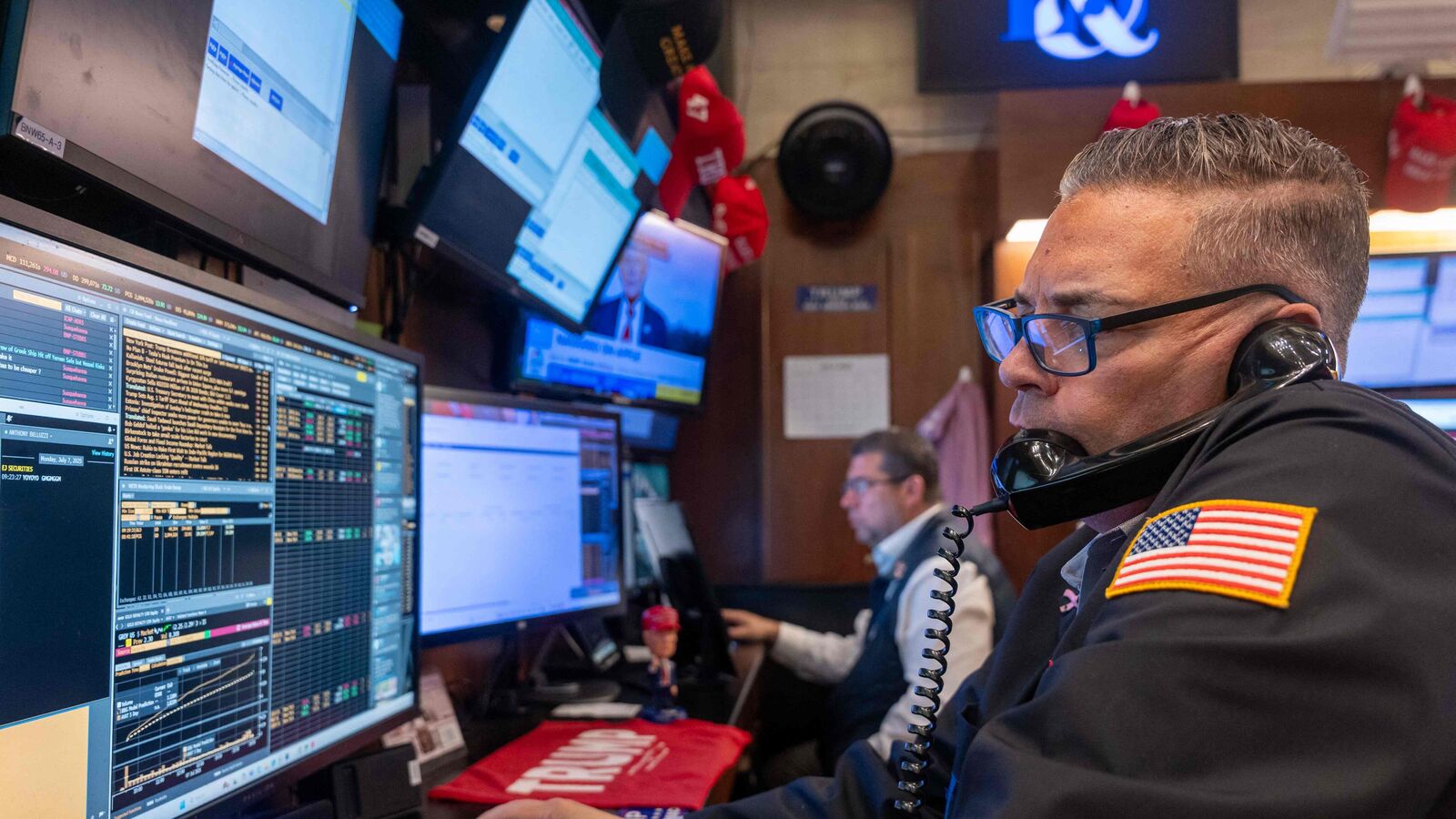 Wall Street Live: US stocks mixed as investors await new trade developments, Intel climbs 4.1%