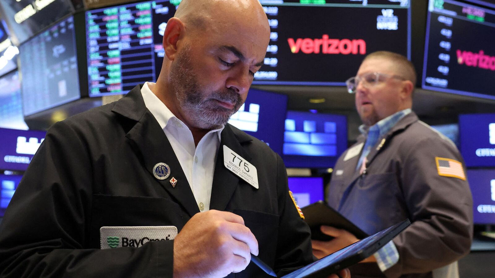 Wall Street Live: US stocks edge down as investors monitor trade talks